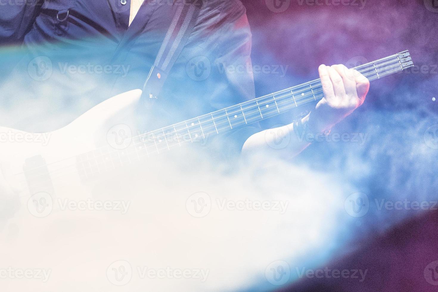 An electric bass player photo