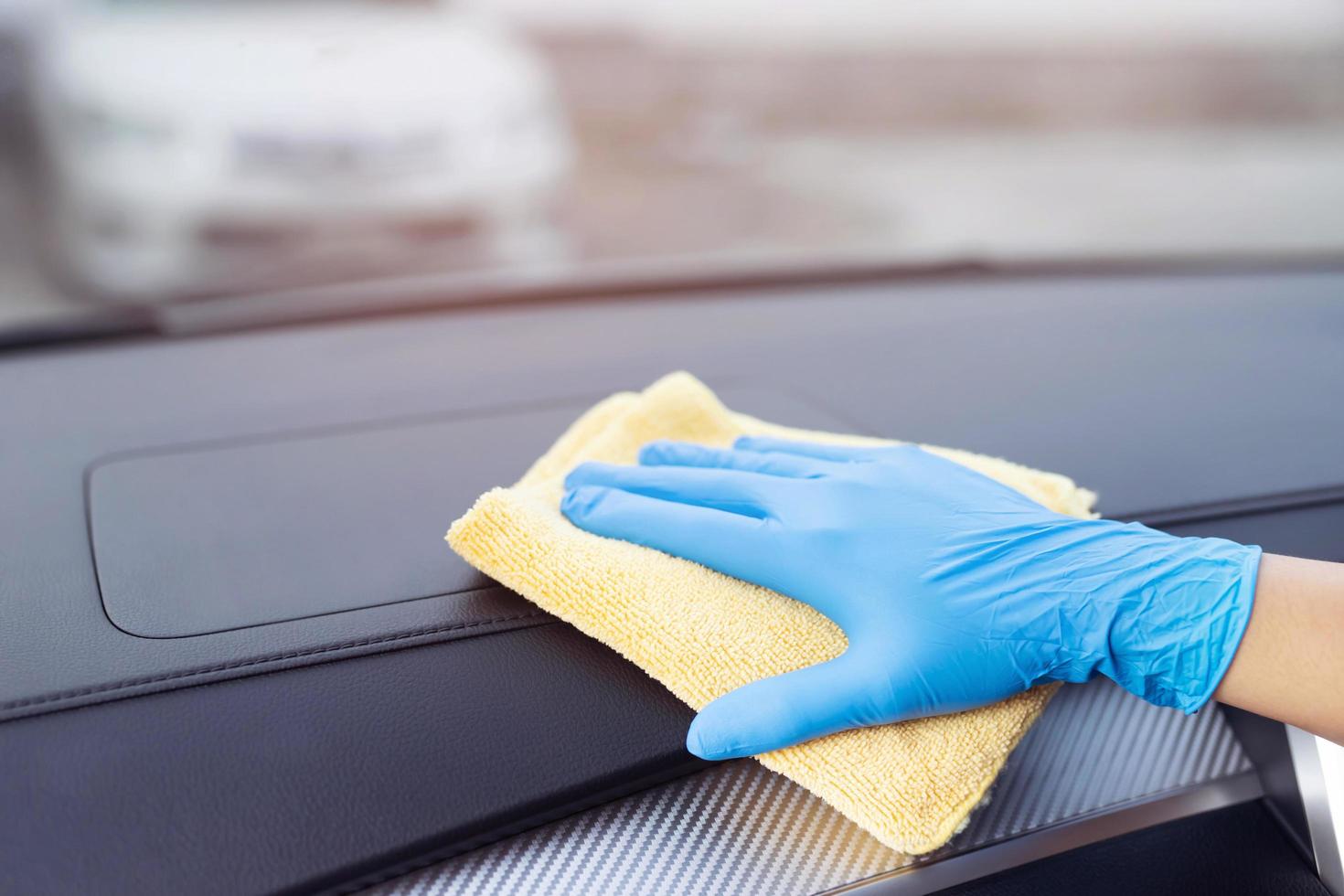 Staff is cleaning in the car photo