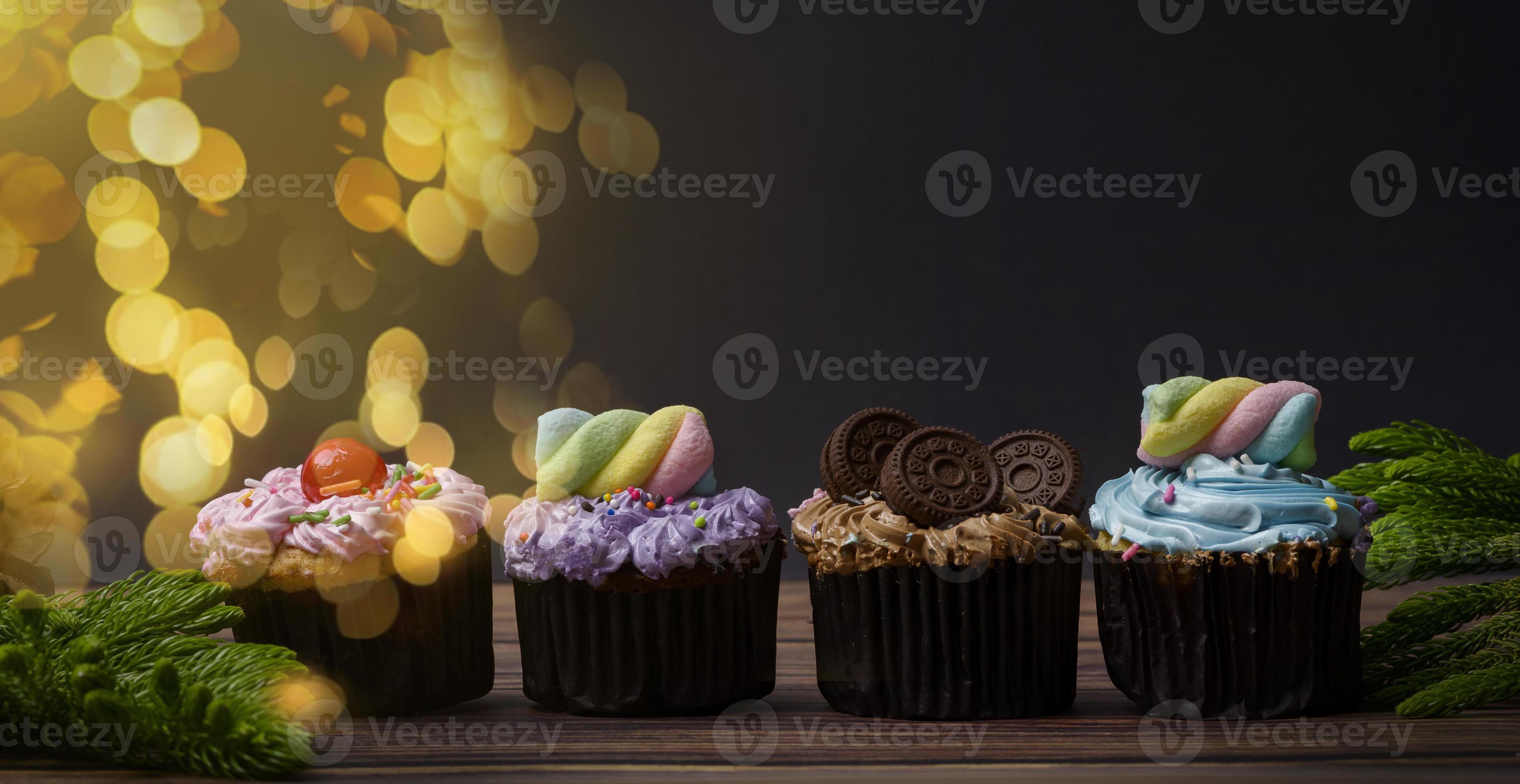 Beautiful cupcakes on wooden table , food background concept 13037914