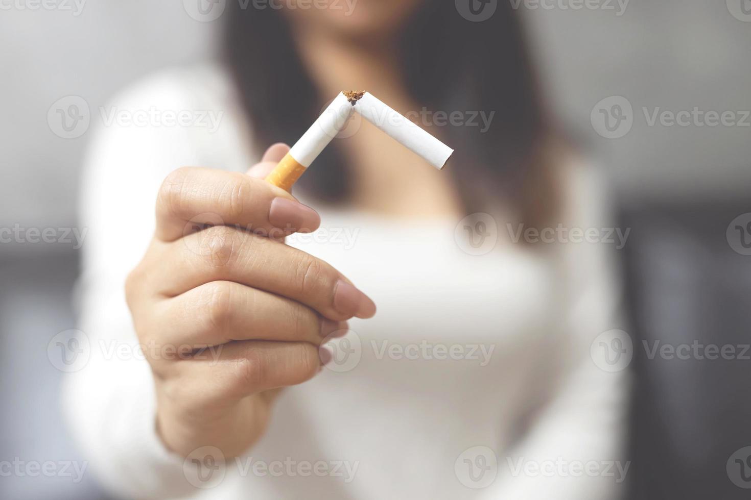 Women quit smoking for health photo