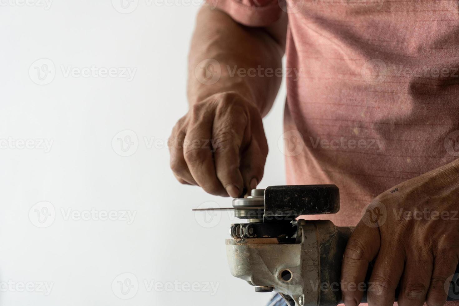 latino man looking for tools in his toolbox, hispanic, with screwdriver in hand photo