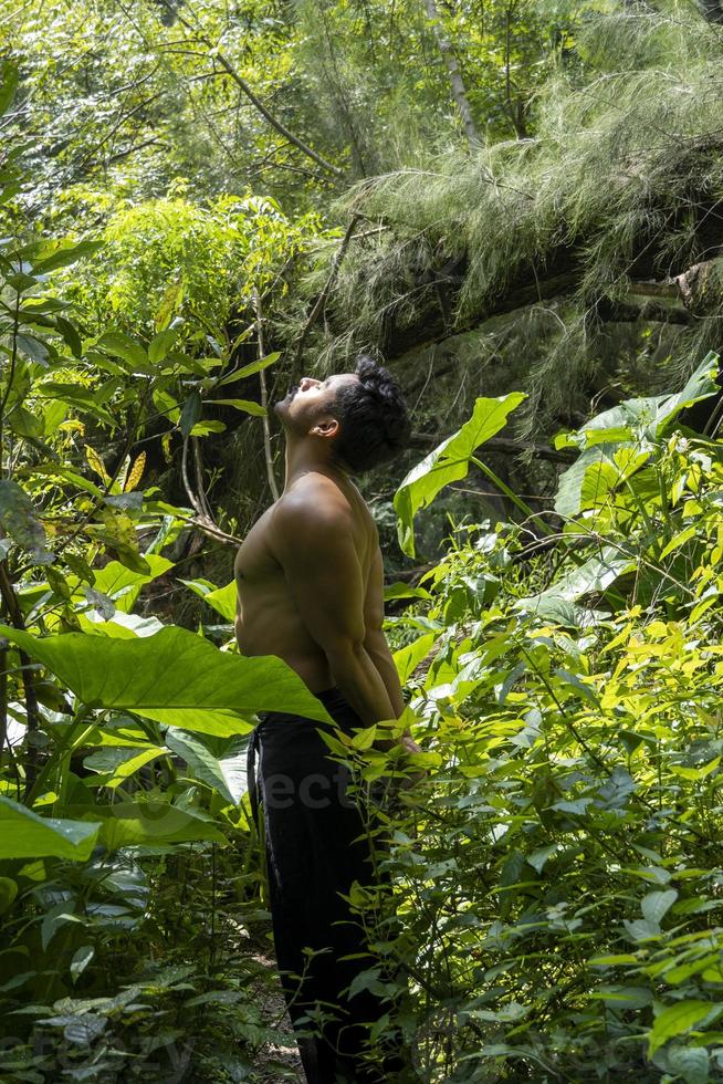 Yoga meditation outdoors. Glowing seven all chakra. man practice yoga, mexico, gualdajara photo