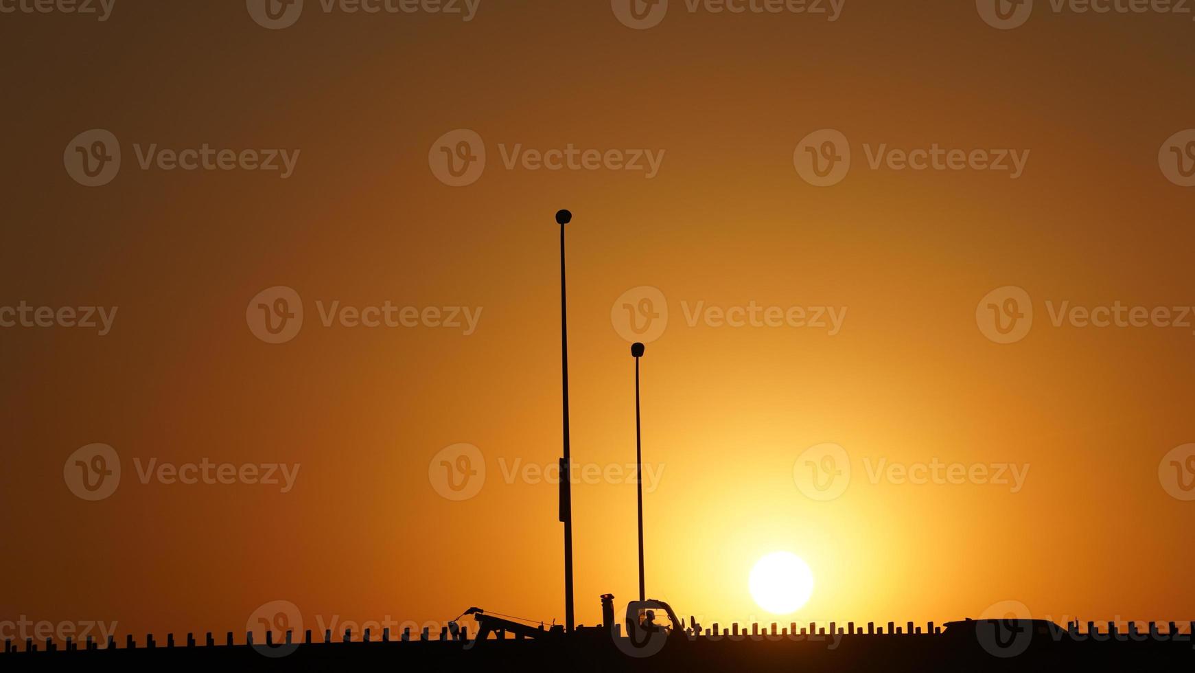 The beautiful sunset view with the colorful clouds and sky in the city photo