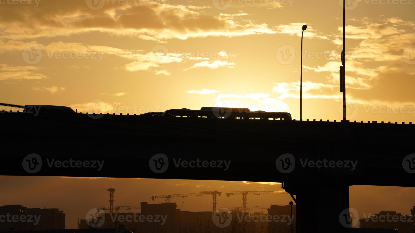 The beautiful sunset view with the colorful clouds and sky in the city photo