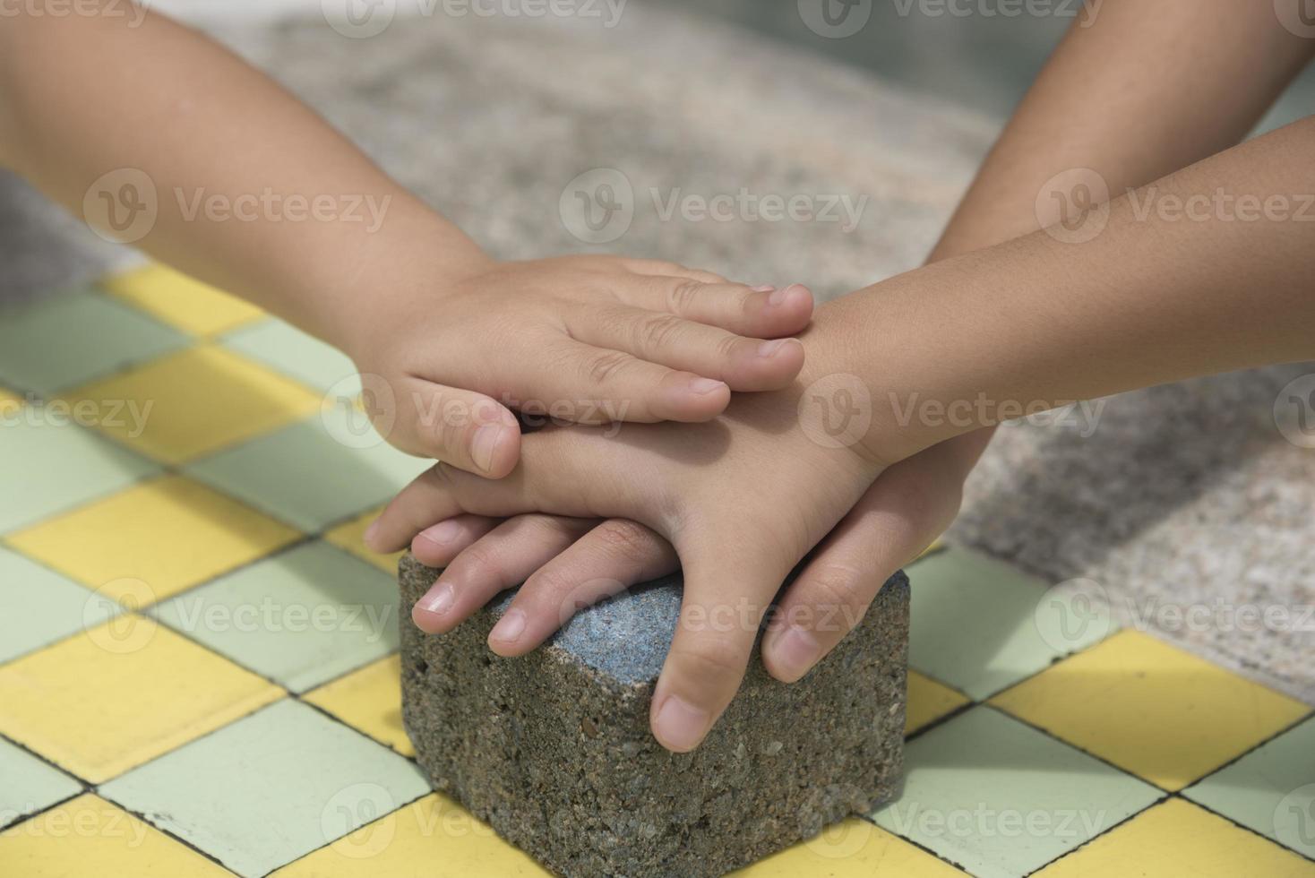 Concept of teamwork of three children photo