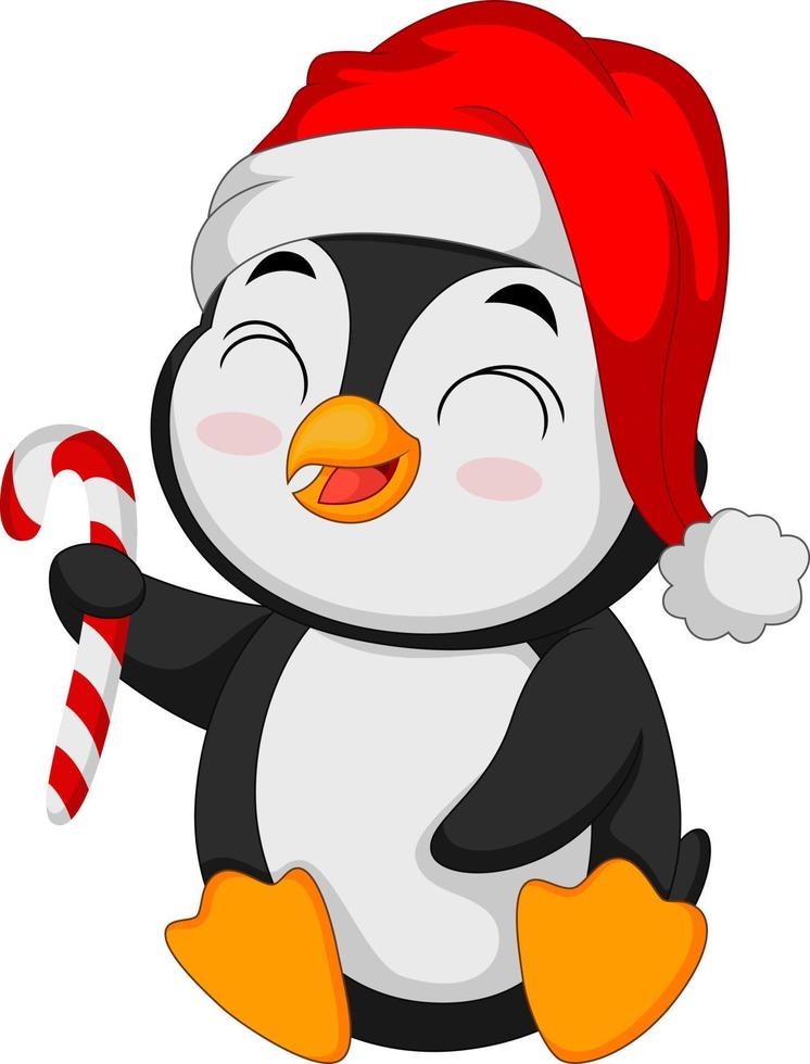 pequeño pingüino lindo en el sombrero de santa que sostiene el caramelo vector