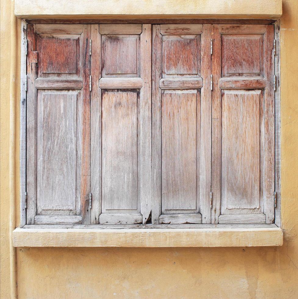 wooden window on concrete background photo