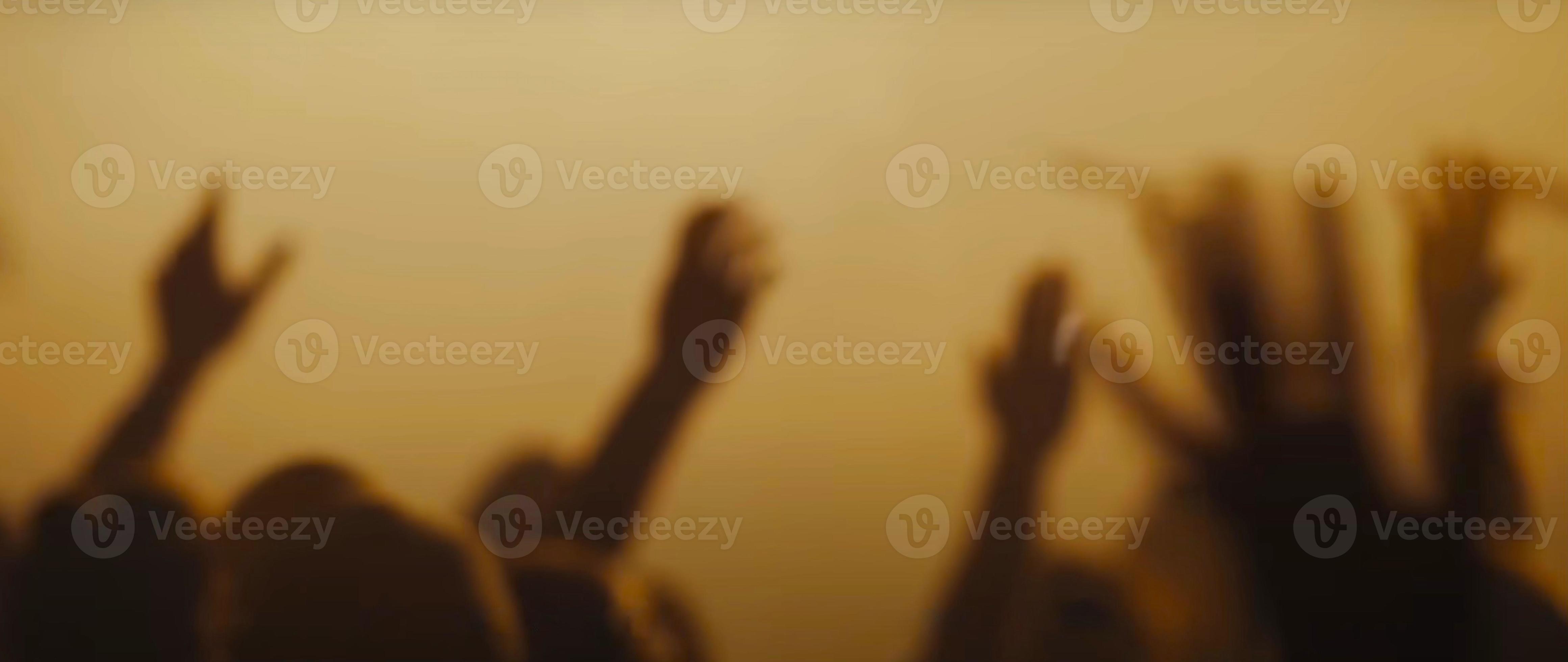 Blurry background picture of hand reaching out for God’s help, good for