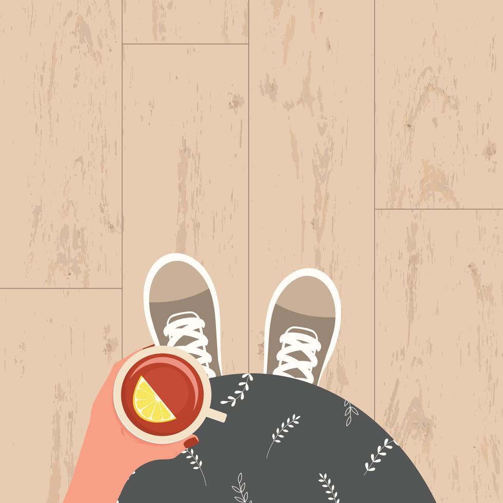 Pregnant girl in sneakers holding a cup of tea with a slice of lemon, top view of her tummy. Vector