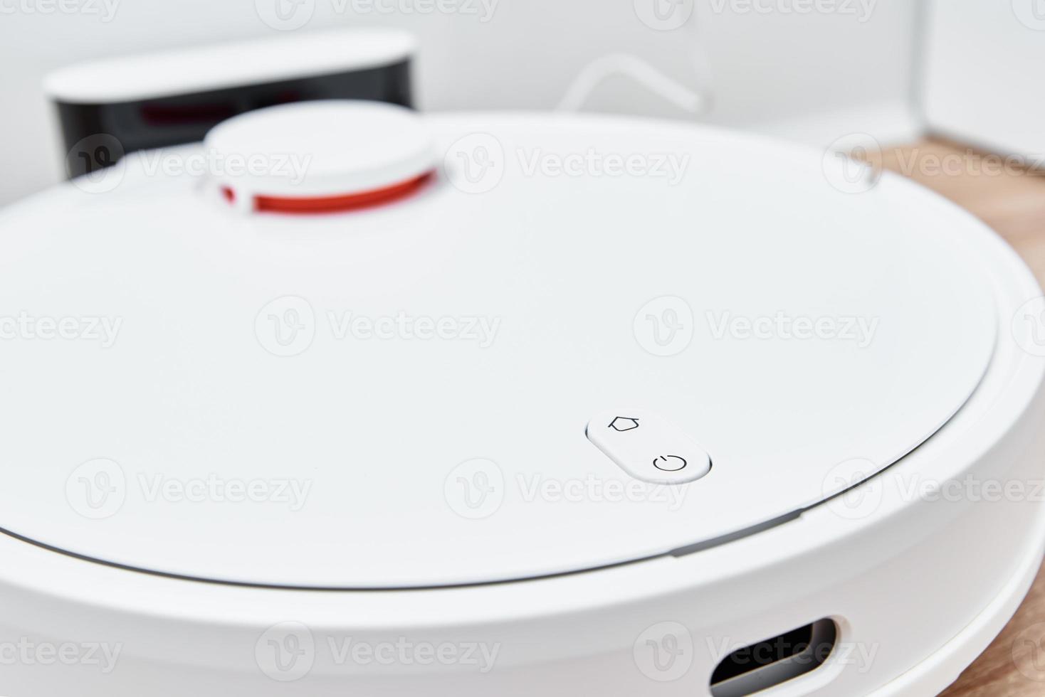 Robot vacuum cleaner return to charge after cleaning room Modern smart household photo