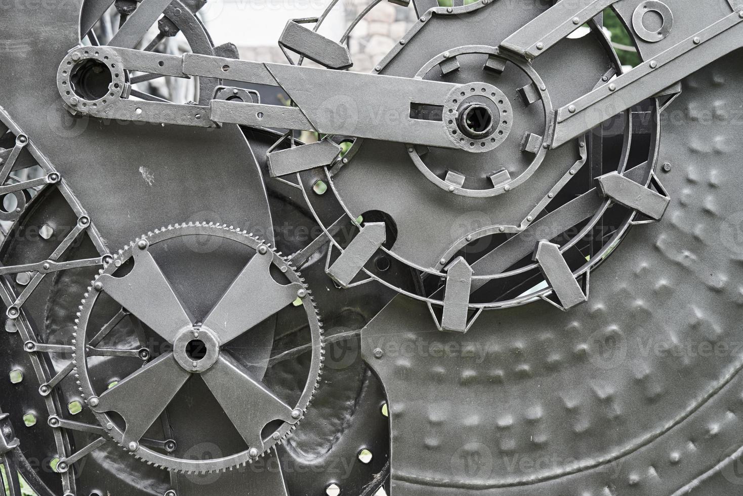 piezas mecánicas de hierro y ruedas dentadas. textura steampunk foto