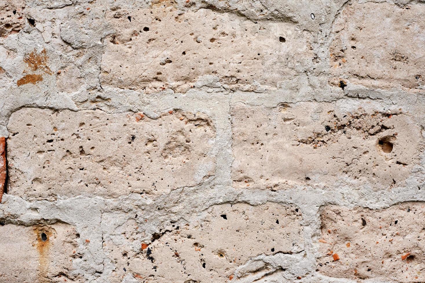 Old gray wall. brickwork masonry background, closeup photo