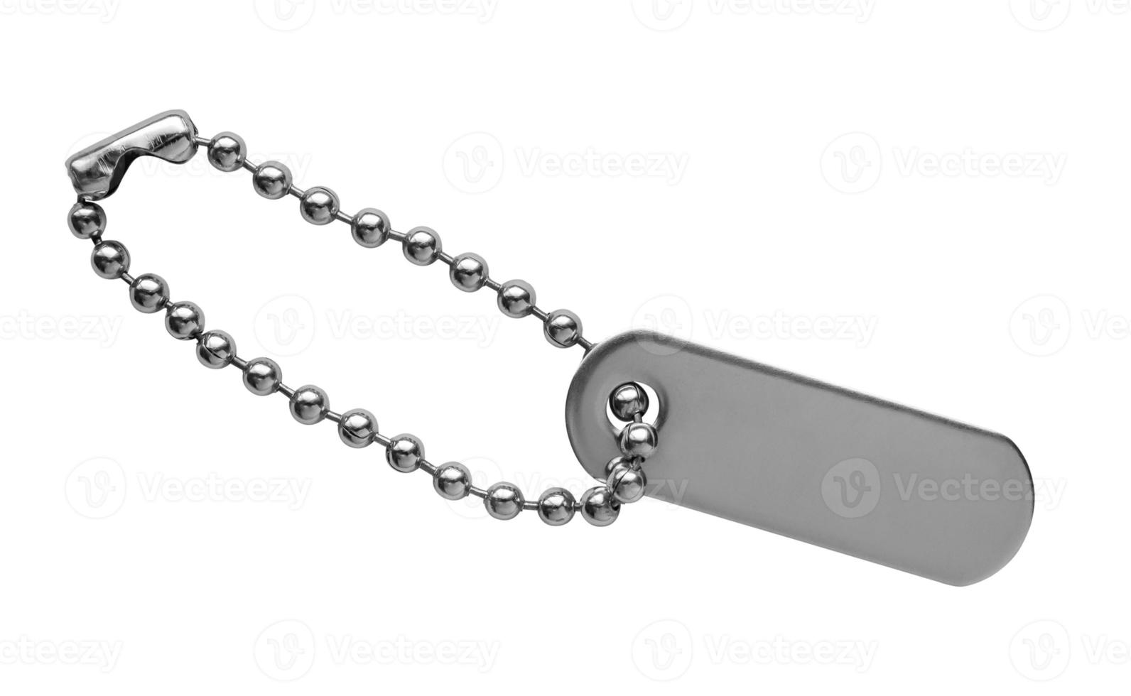 Blank metal tag isolated on white background photo