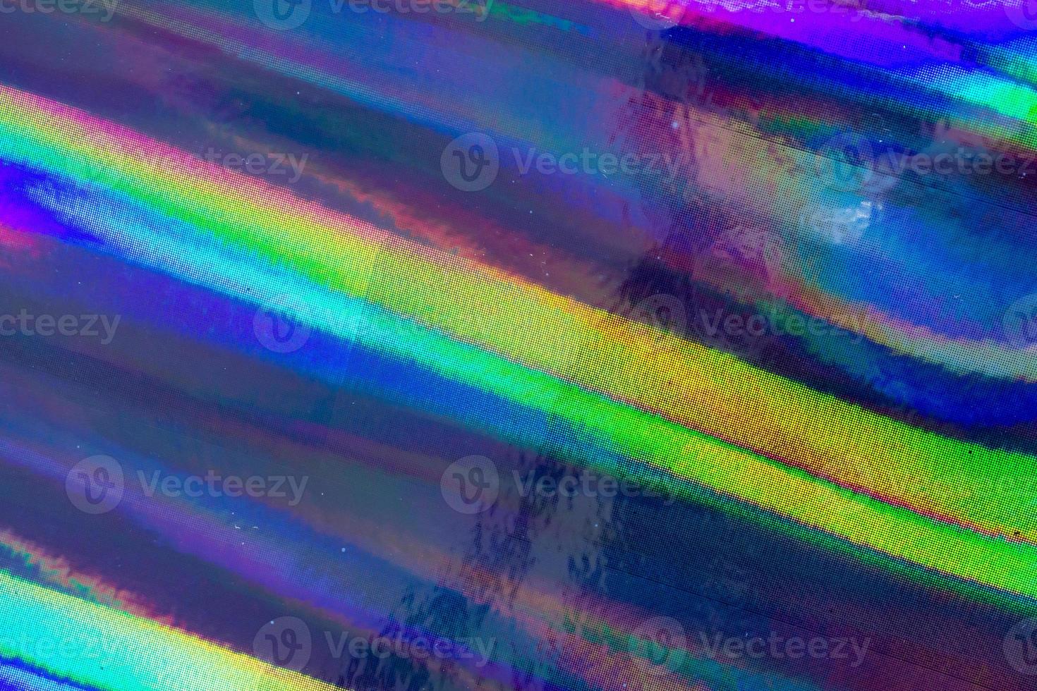 fondo de holograma abstracto de textura iridiscente de hoja de arco iris holográfica foto