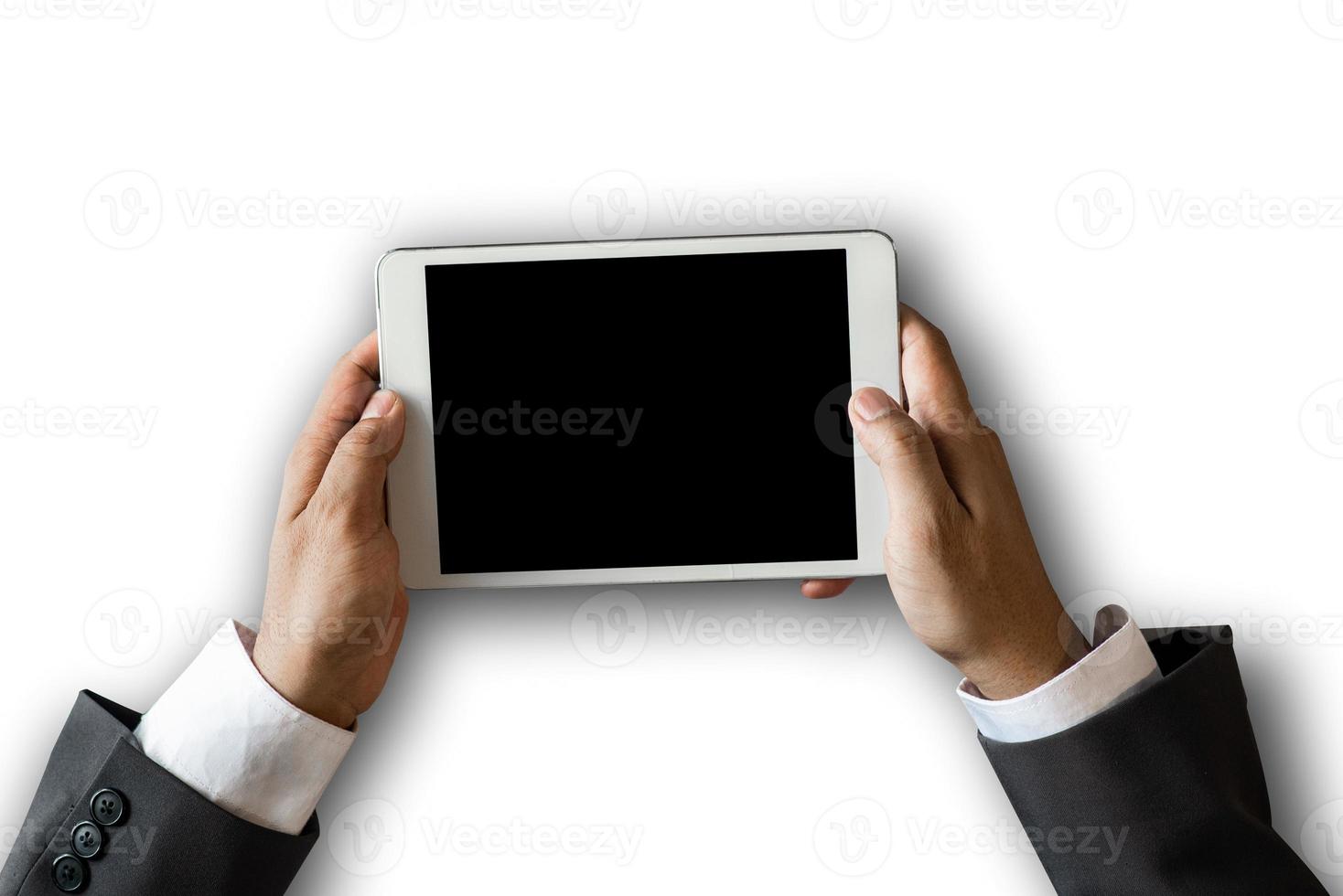 Hand holding tablet photo