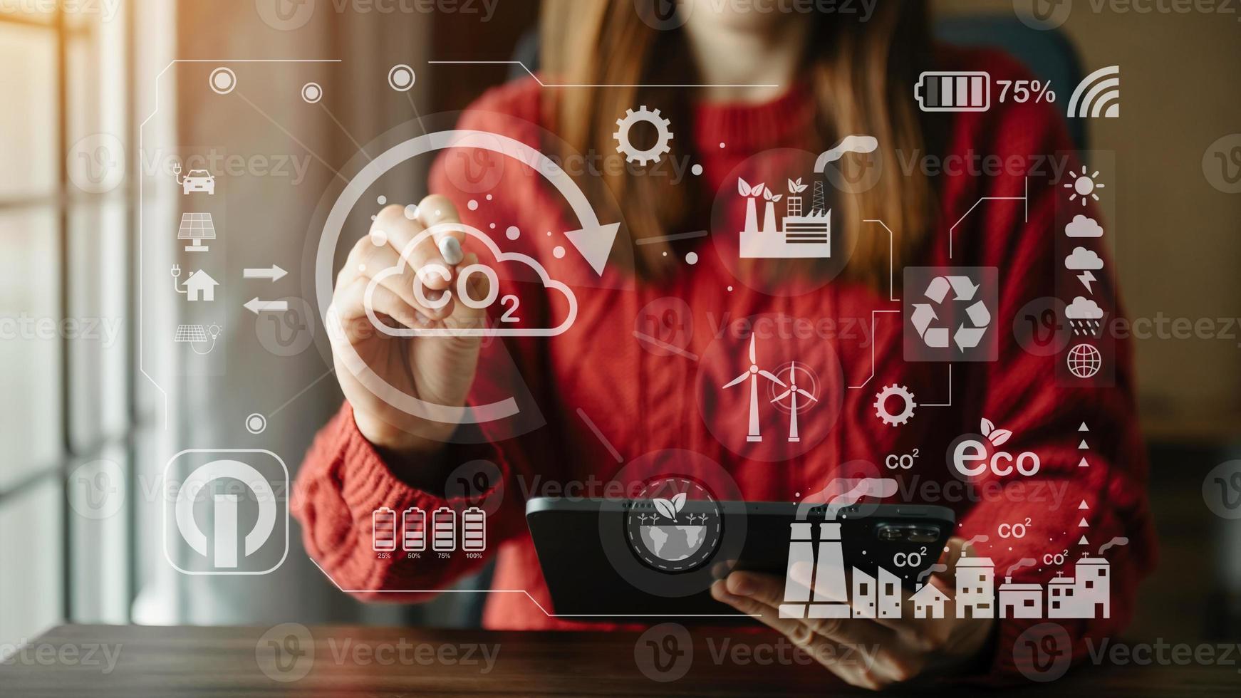 Business working with reduce CO2 concept with icons, global warming such as reforest green factory recycle and zero carbon dioxide emission concept. with VR icon at office photo