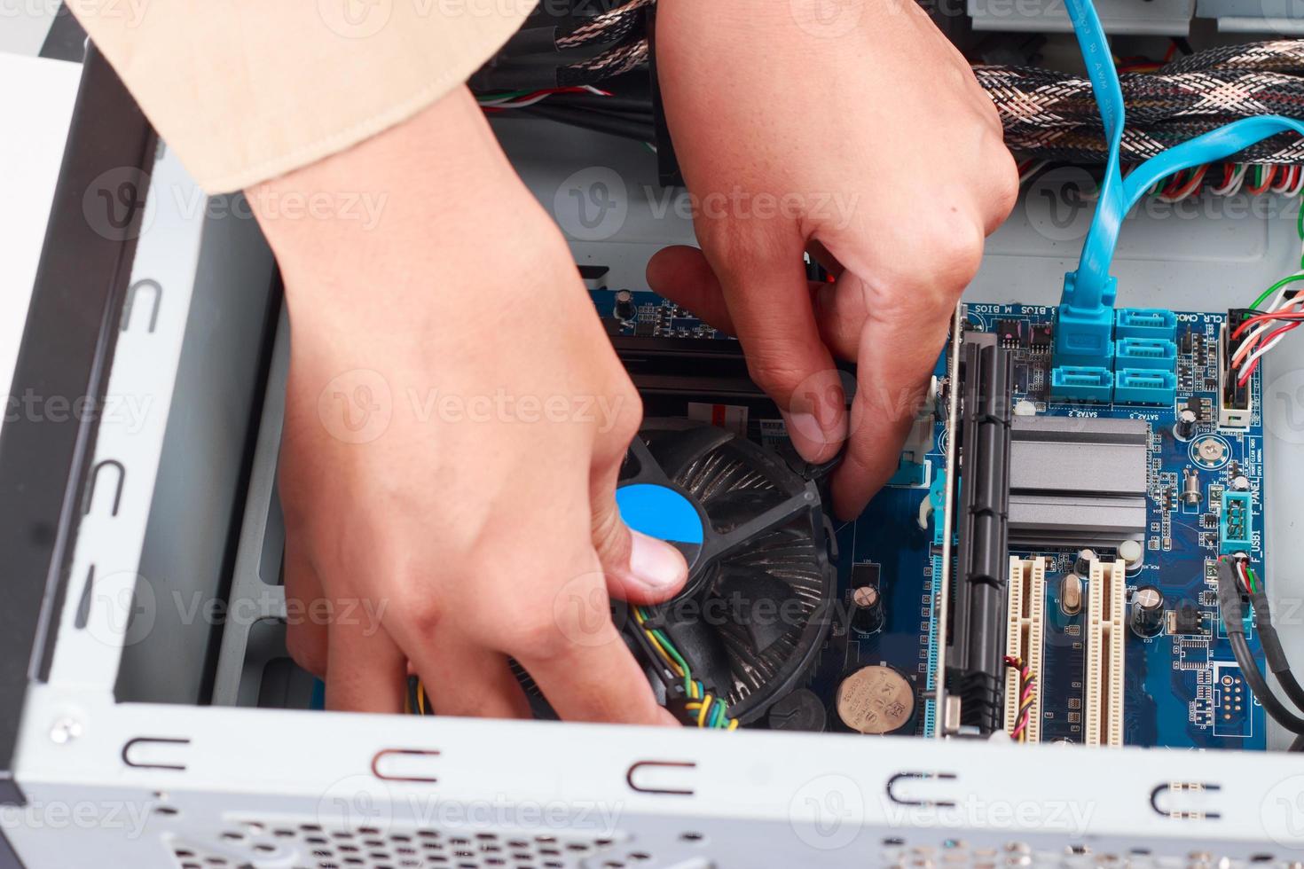 Technical specialists are repairing computers, electronic devices. photo