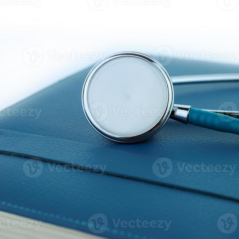 Stethoscope  on a notebook photo