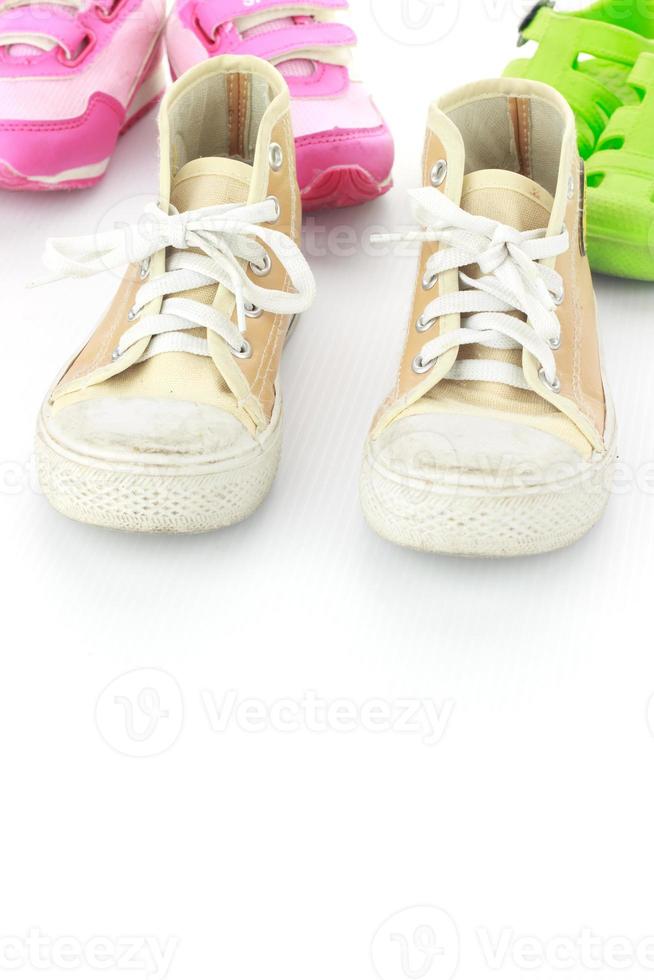 Kid shoes isolate on white photo