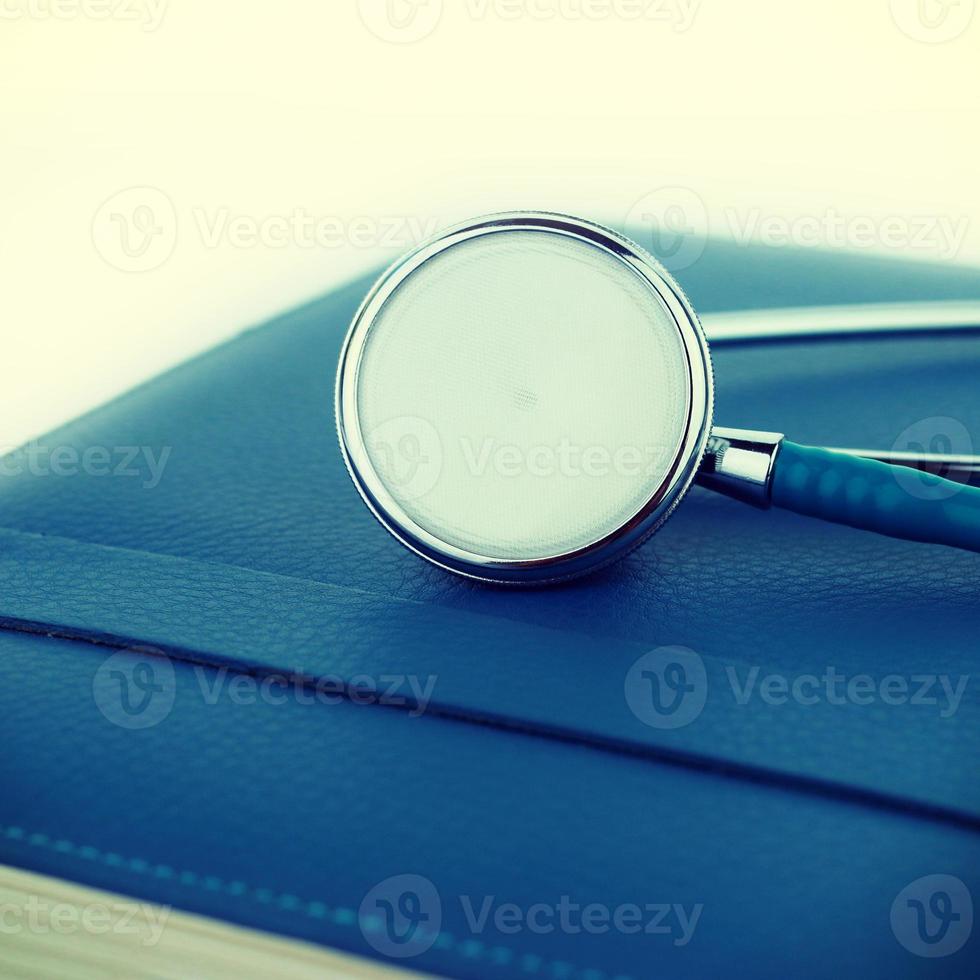 Stethoscope  on a notebook background-instagram filter photo