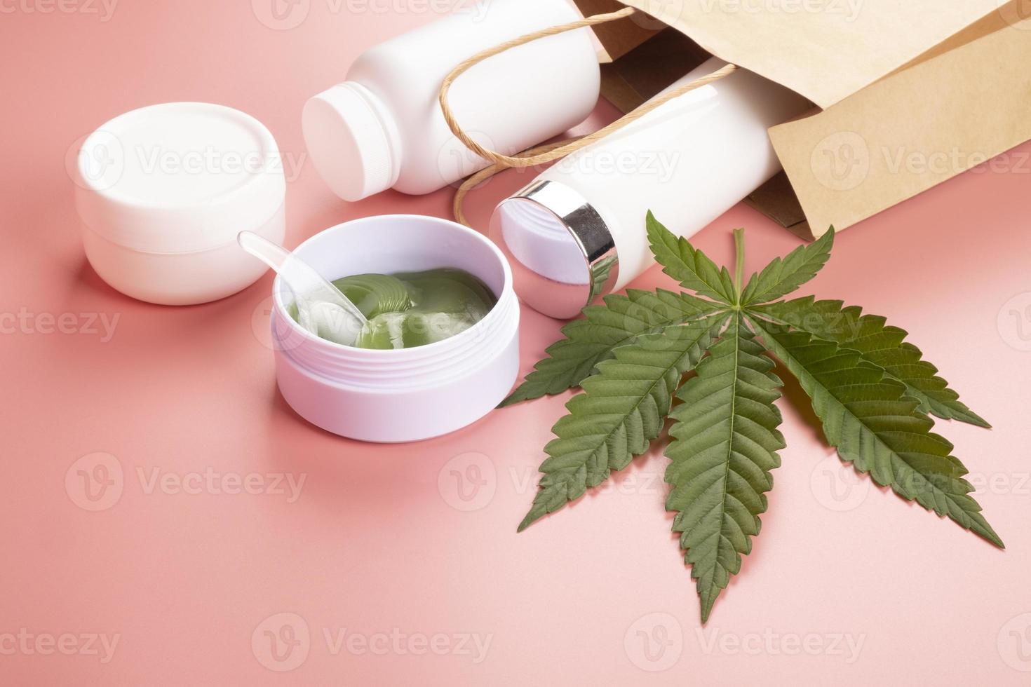 cosmetic skin care set and marijuana green leaf photo