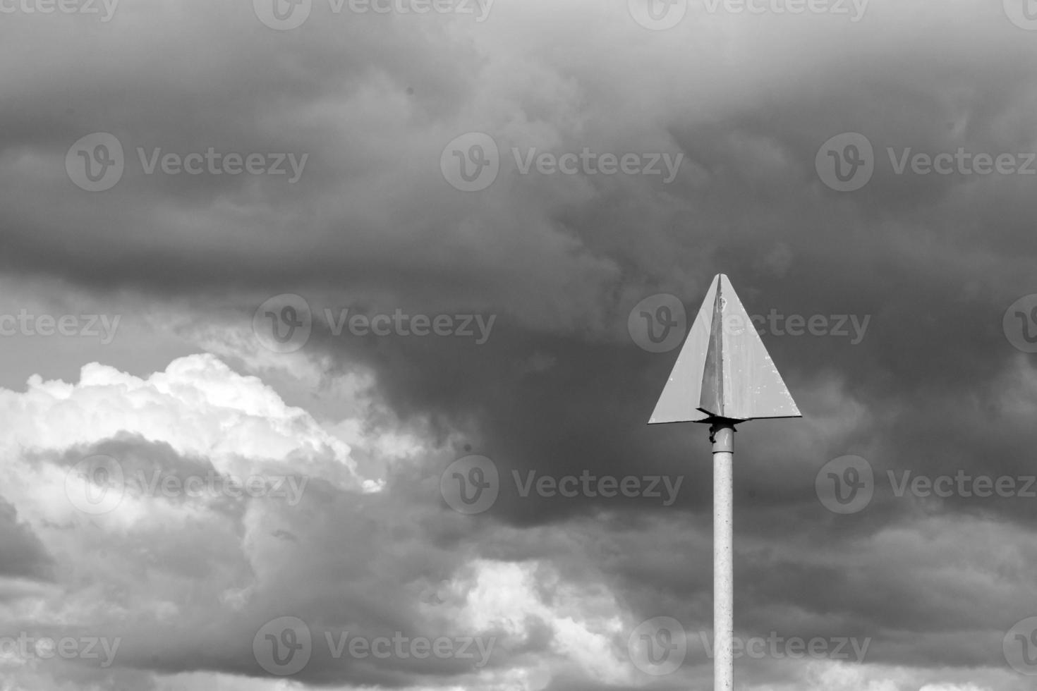 ship sign with storm clouds and lightning photo