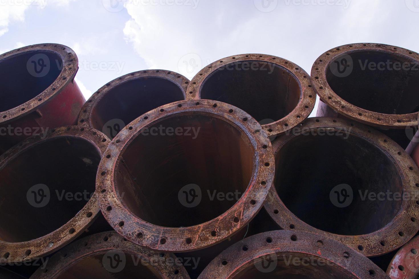 A texture industrial background of Rusty iron pipes  stack photo