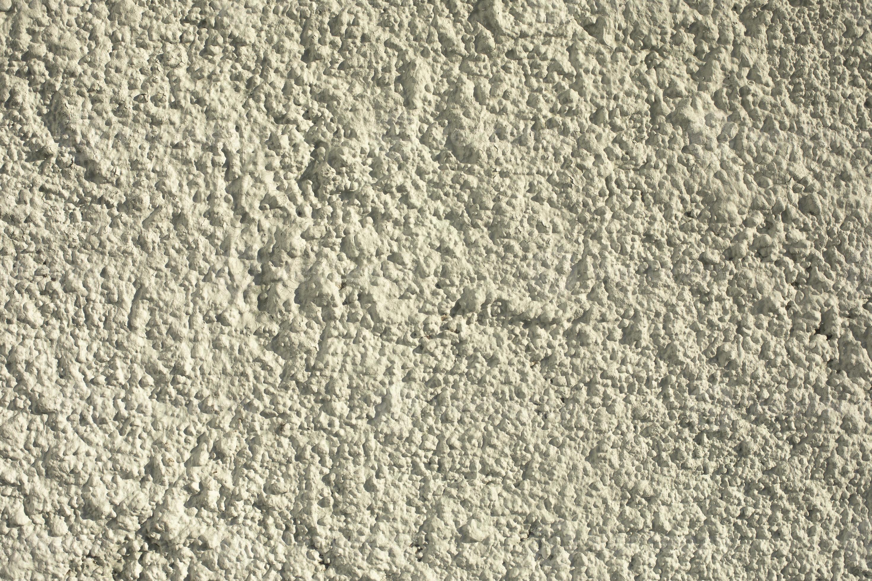 Rough texture of gray stone, close-up. Building materials 