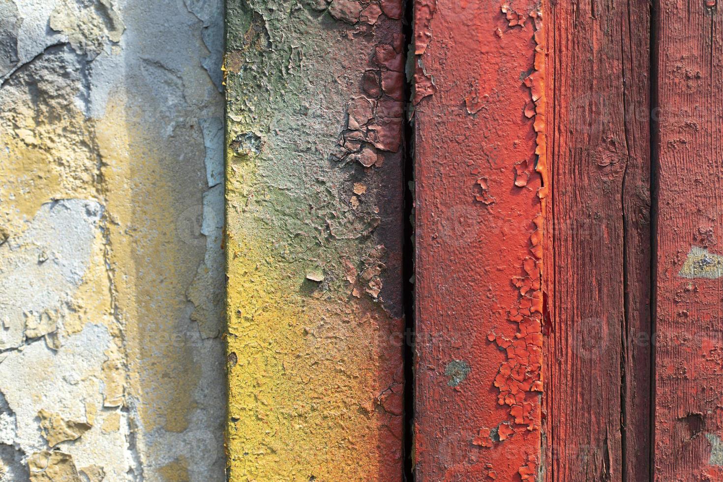Boards in paint. Old wall. Surface texture of different colors. photo