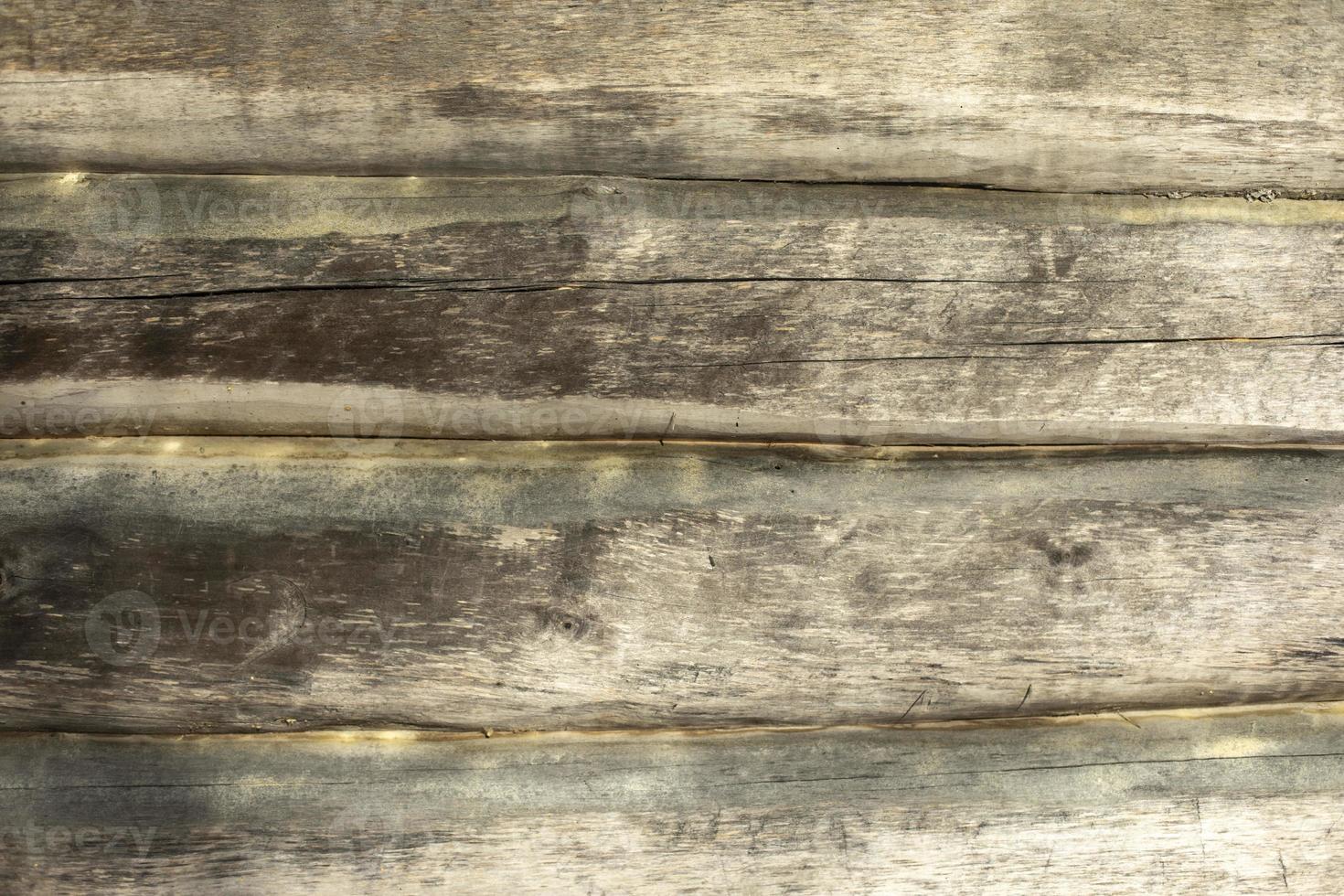 Texture of logs in wall. Details of house in village. photo