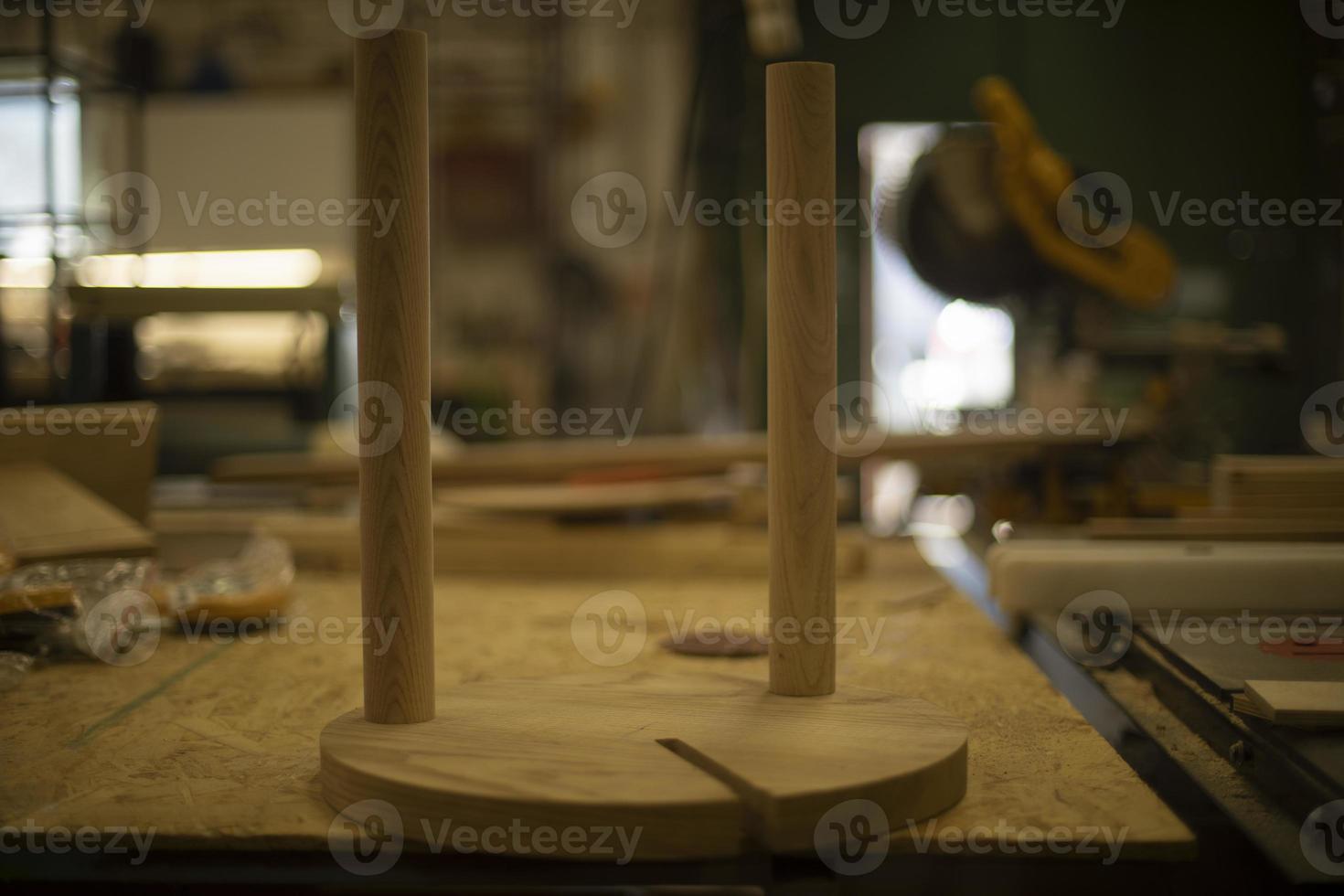 Chair in carpentry workshop. Creation of furniture. Production of wood. photo