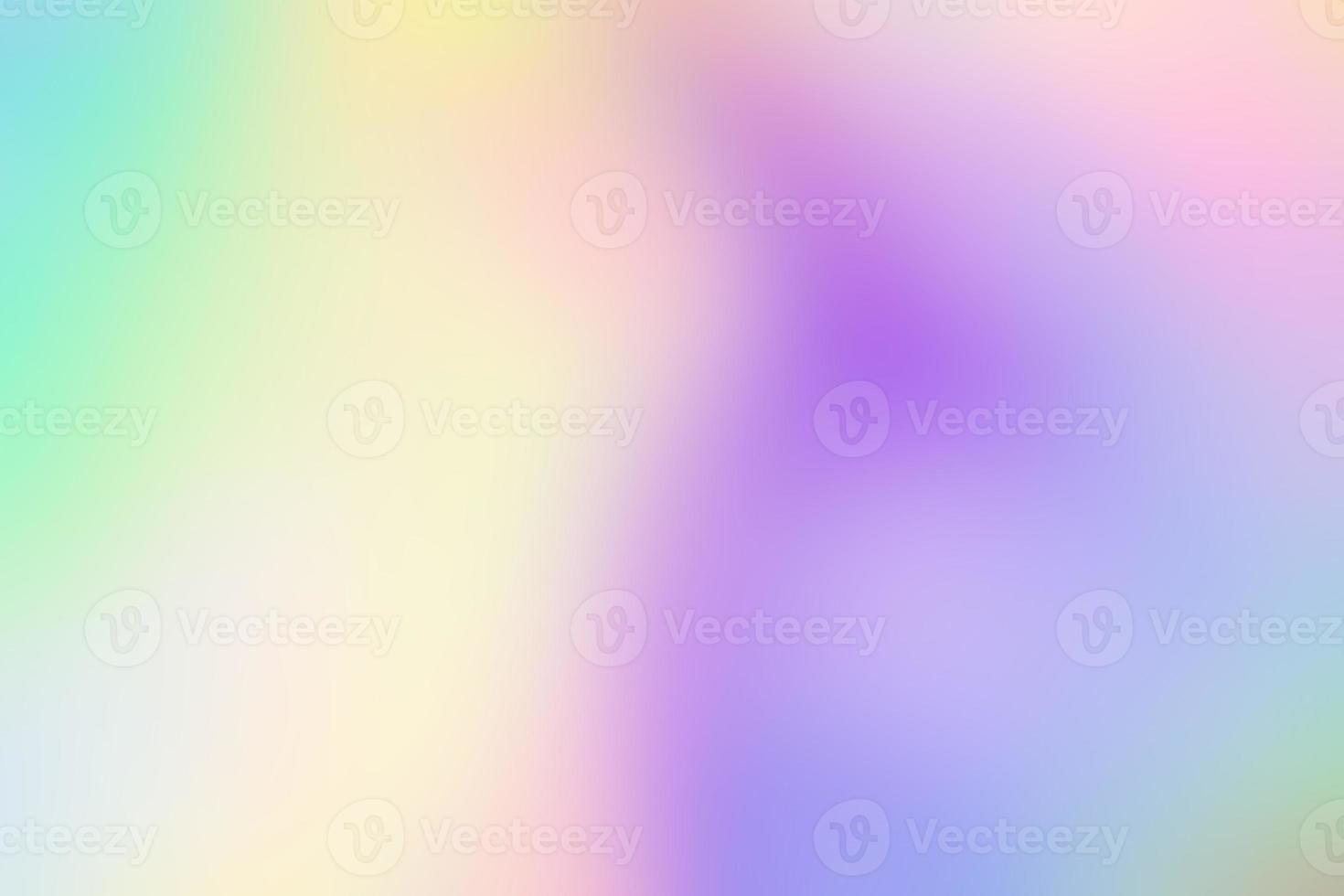 Abstract blur holographic rainbow foil iridescent background photo