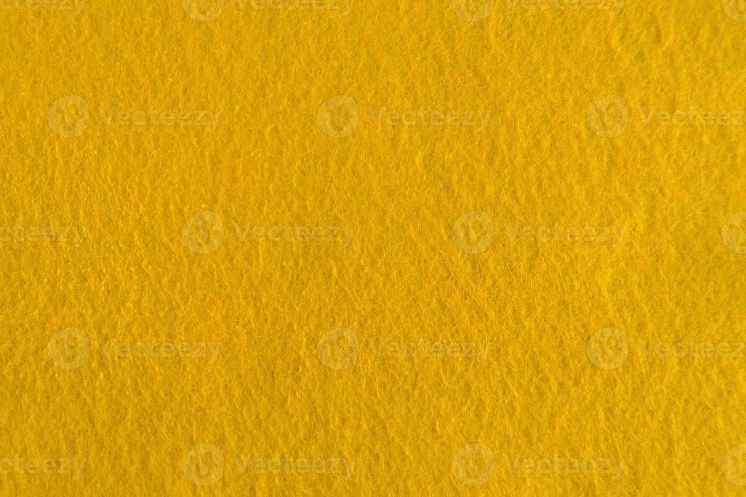 Yellow felt natural texture for background. photo