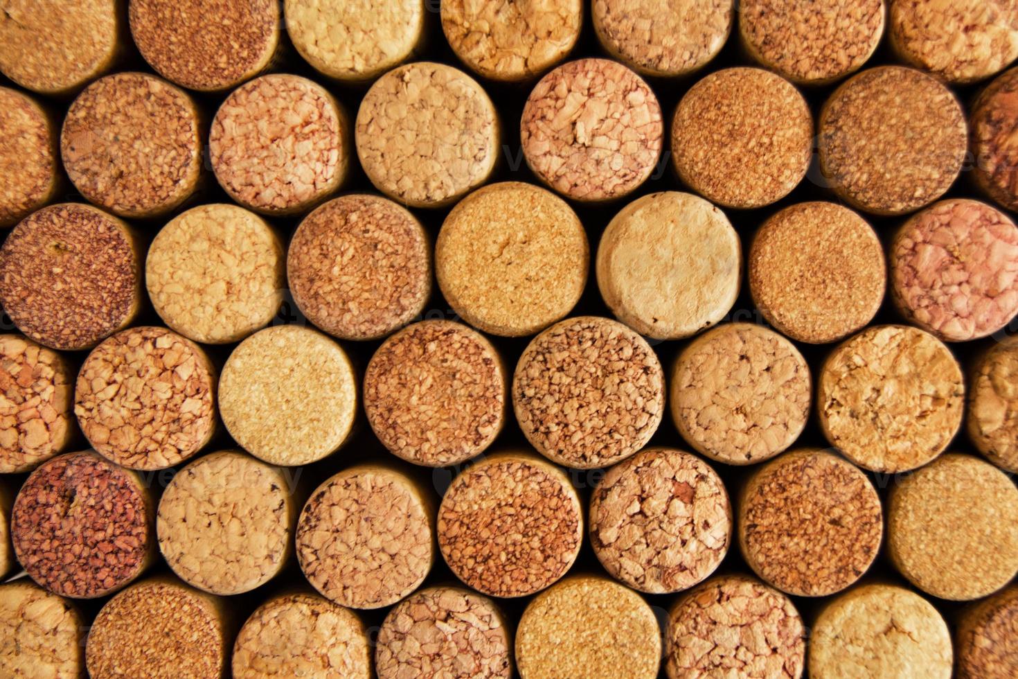 Background from textured wine corks closeup, top view. photo