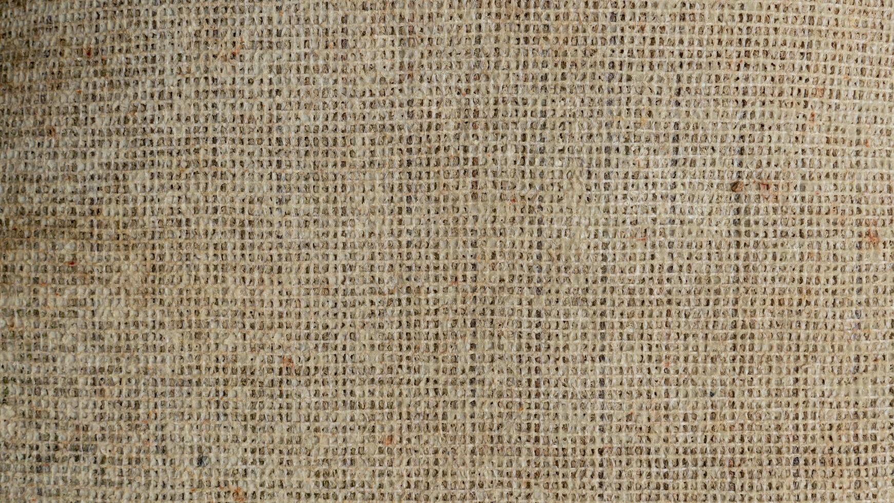 Background and textured of brown rough cloth. Detail of visible fluff and fibers. photo