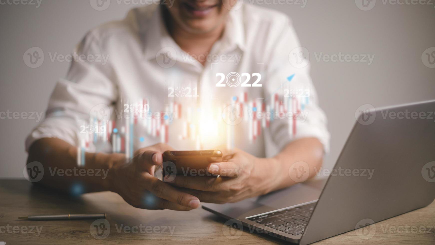Businessman corporate future growth year 2021 to 2022. Planning, opportunity, challenge, and business strategy. New Goals, Plans, and Visions for Next Year 2022. photo