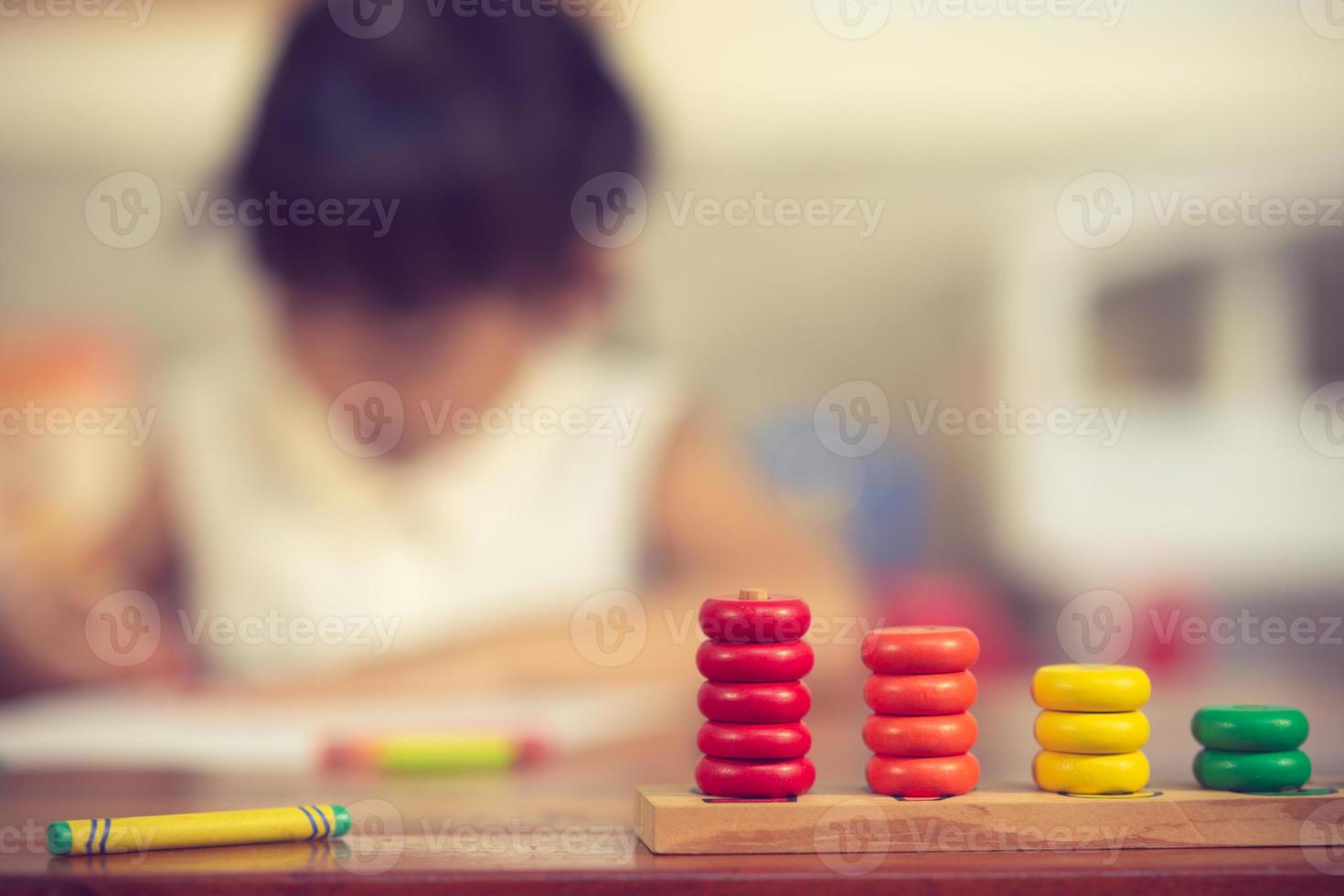 Preschooler child girl drawing and coloring photo