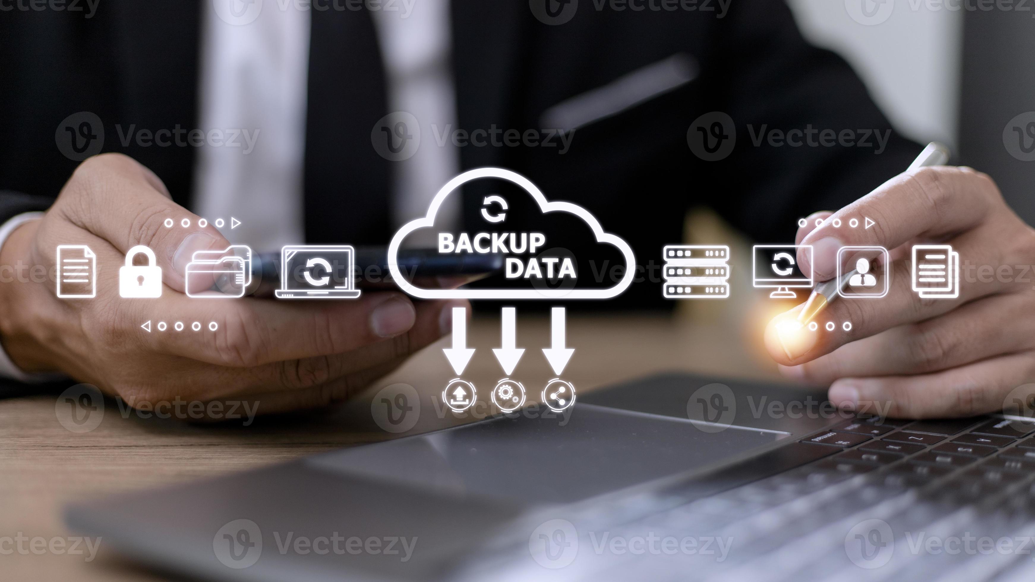 Businessman using a computer to backup storage data technology