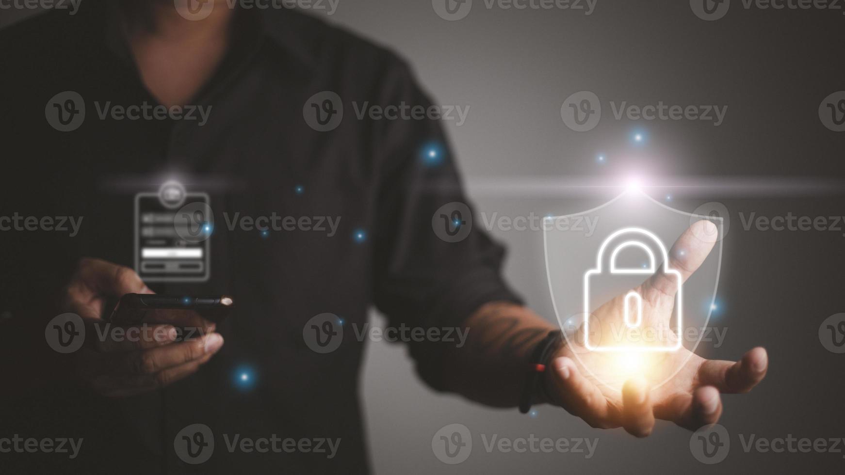 Protection network security computer and safe your data concept, Businessman holding shield protect icon photo