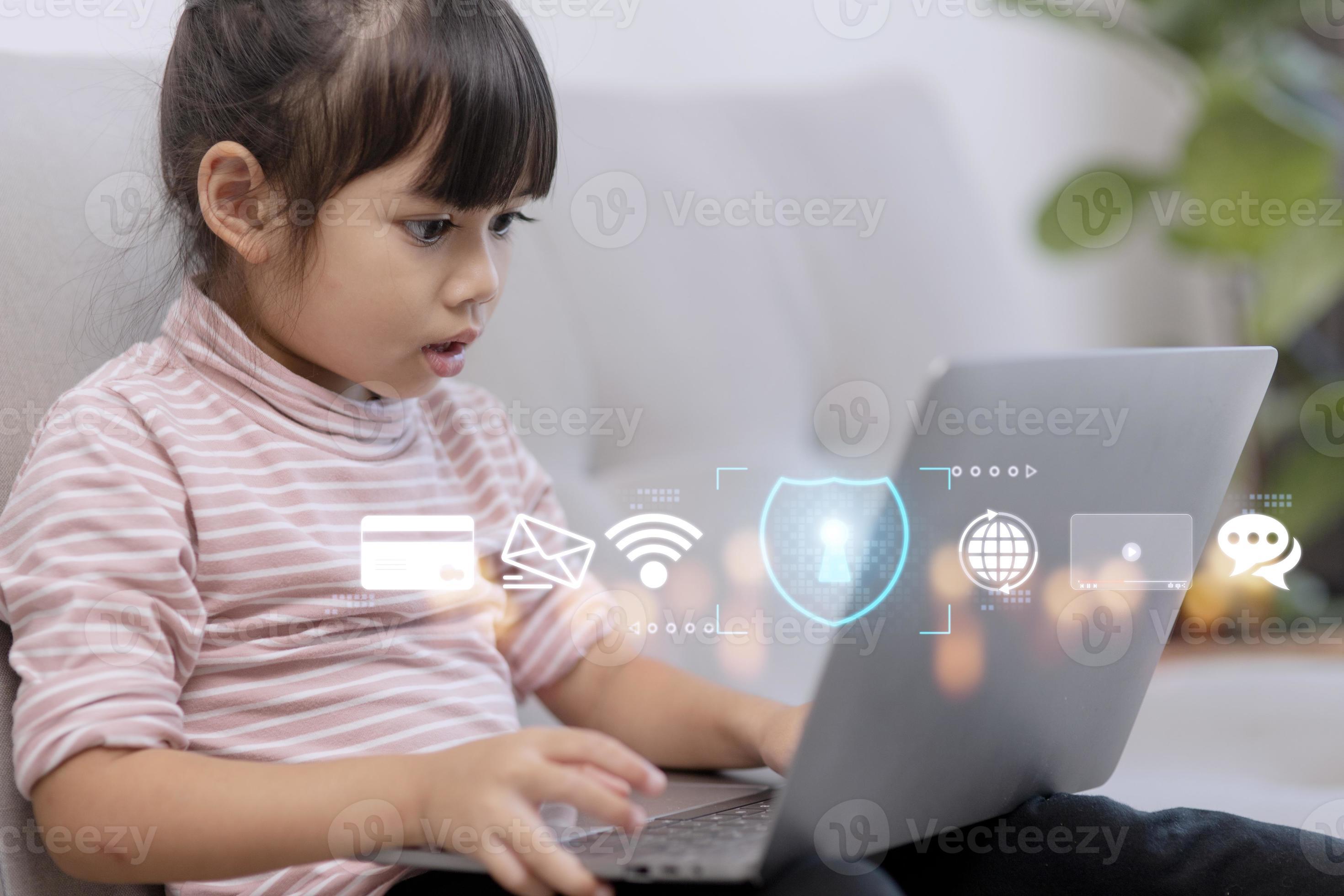 Child safety online. Little girl using laptop at home. icon of