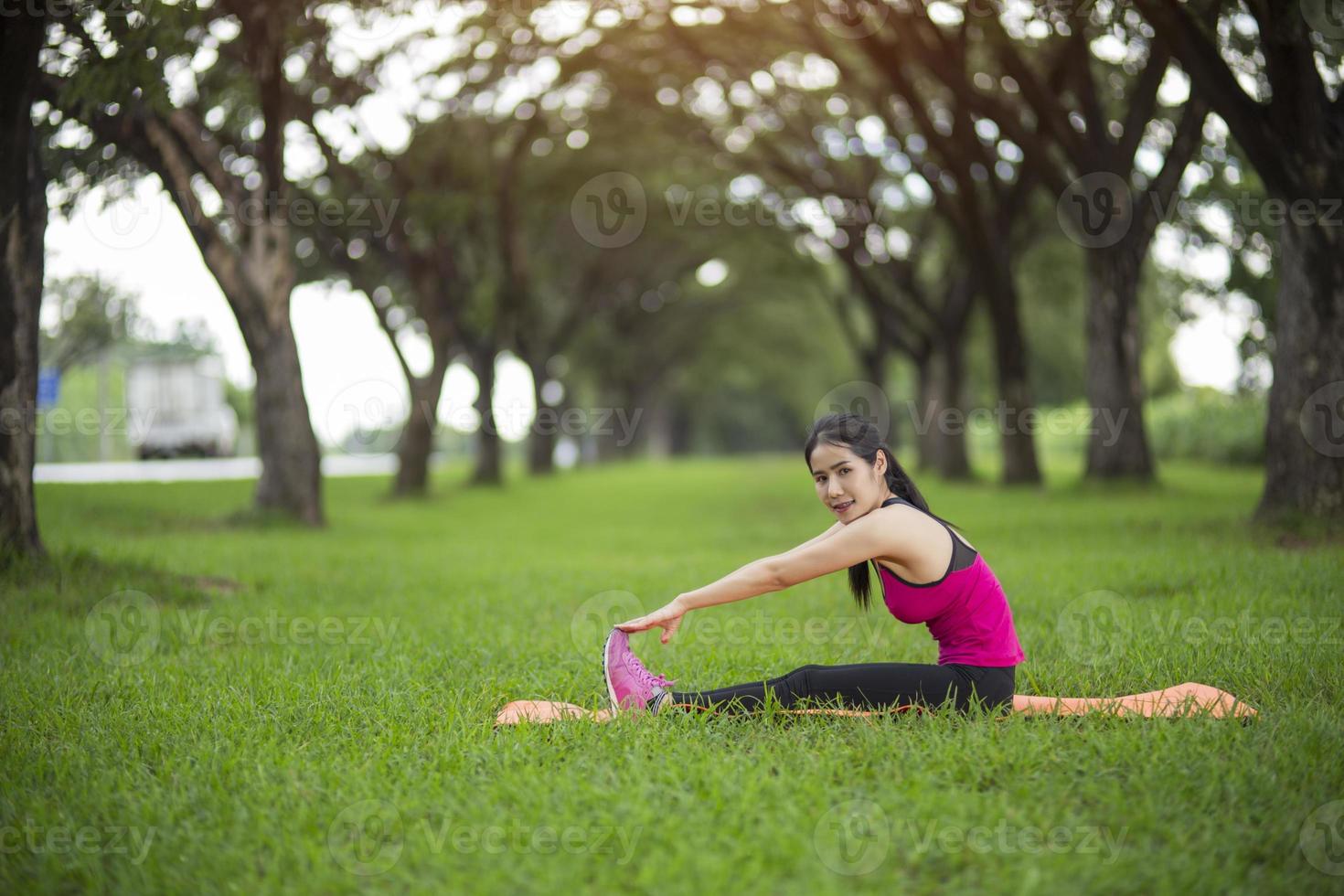 Women exercising.Women exercising in sunny bright light. photo
