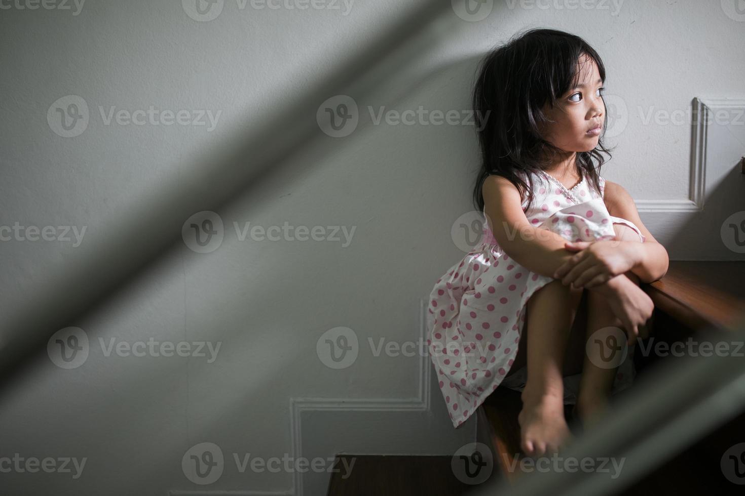 Sad child from this father and mother arguing, family negative concept.vintage color photo