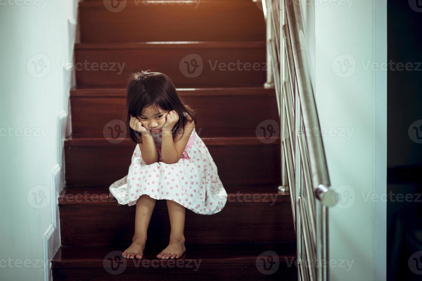 Sad child from this father and mother arguing, family negative concept.vintage color photo