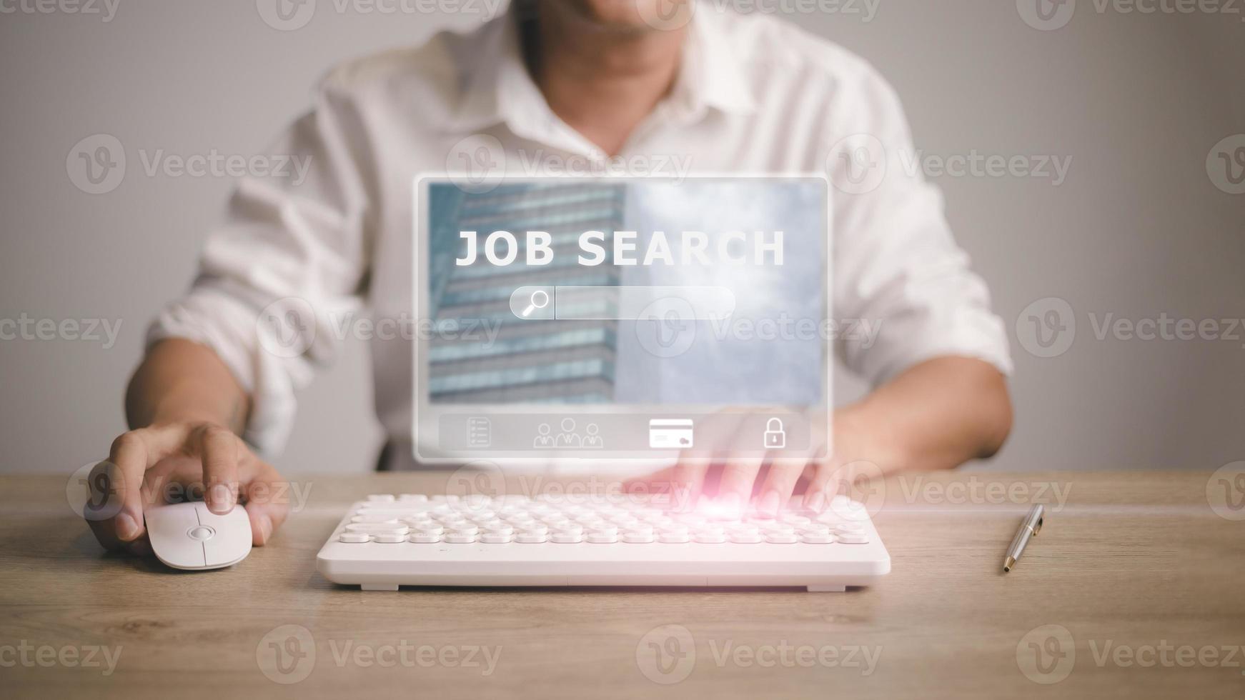 job search concept, man browsing work opportunities online using job search computer app. find your career, man looking at online website by laptop computer. photo