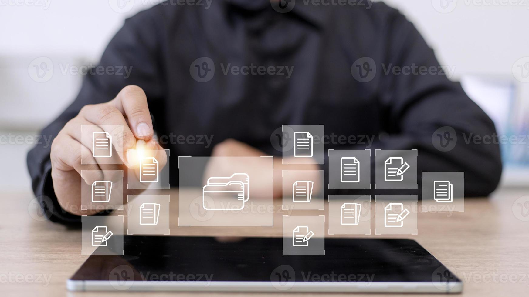 Businessman with Document Management System DMS Online Document Database and automated processes in file management Search and manage document database files online. photo
