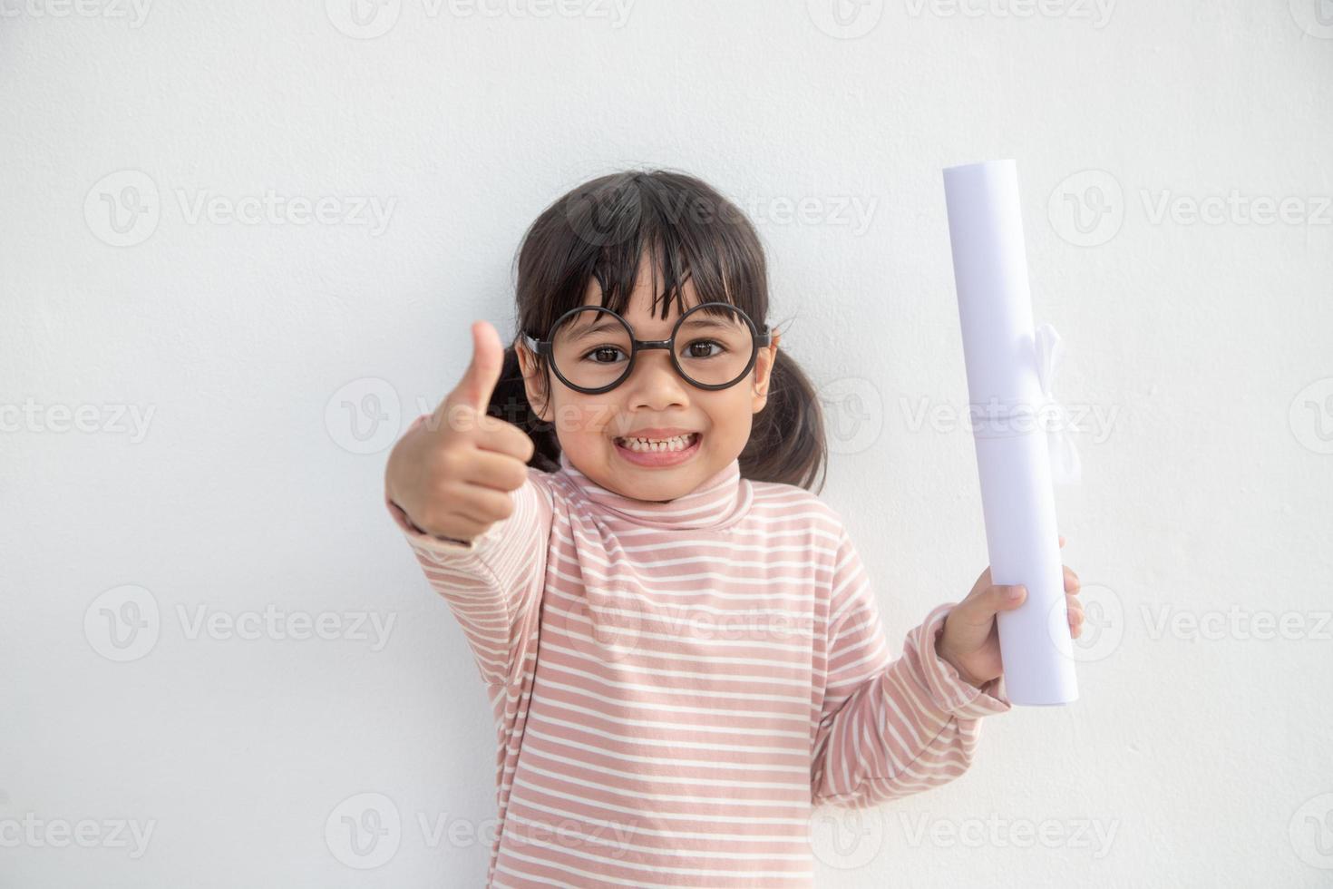 happy little girls with graduation concept photo