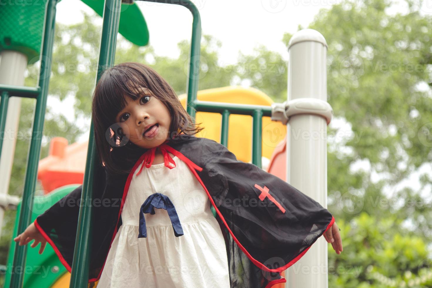 Children in costumes going to trick or treat photo