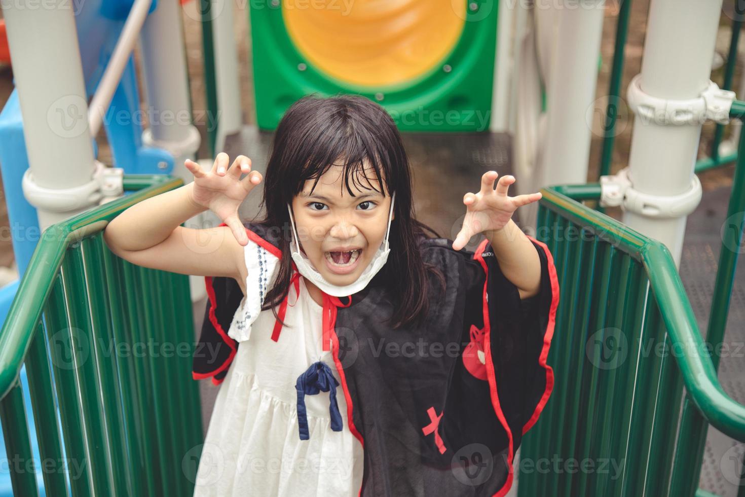 Children in costumes going to trick or treat photo