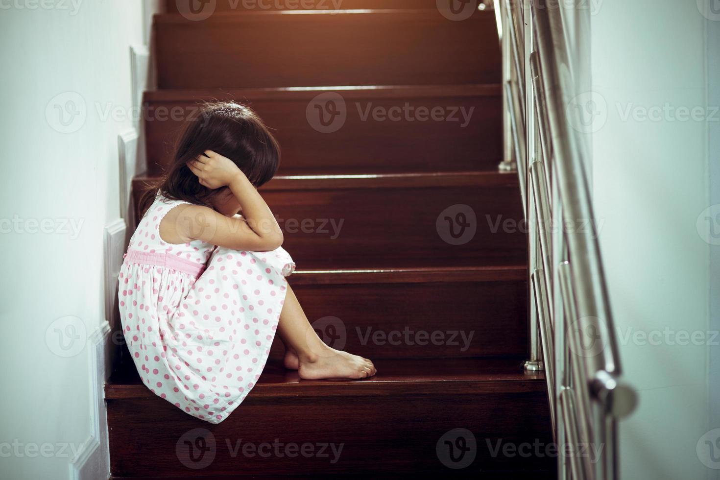 Sad child from this father and mother arguing, family negative concept.vintage color photo