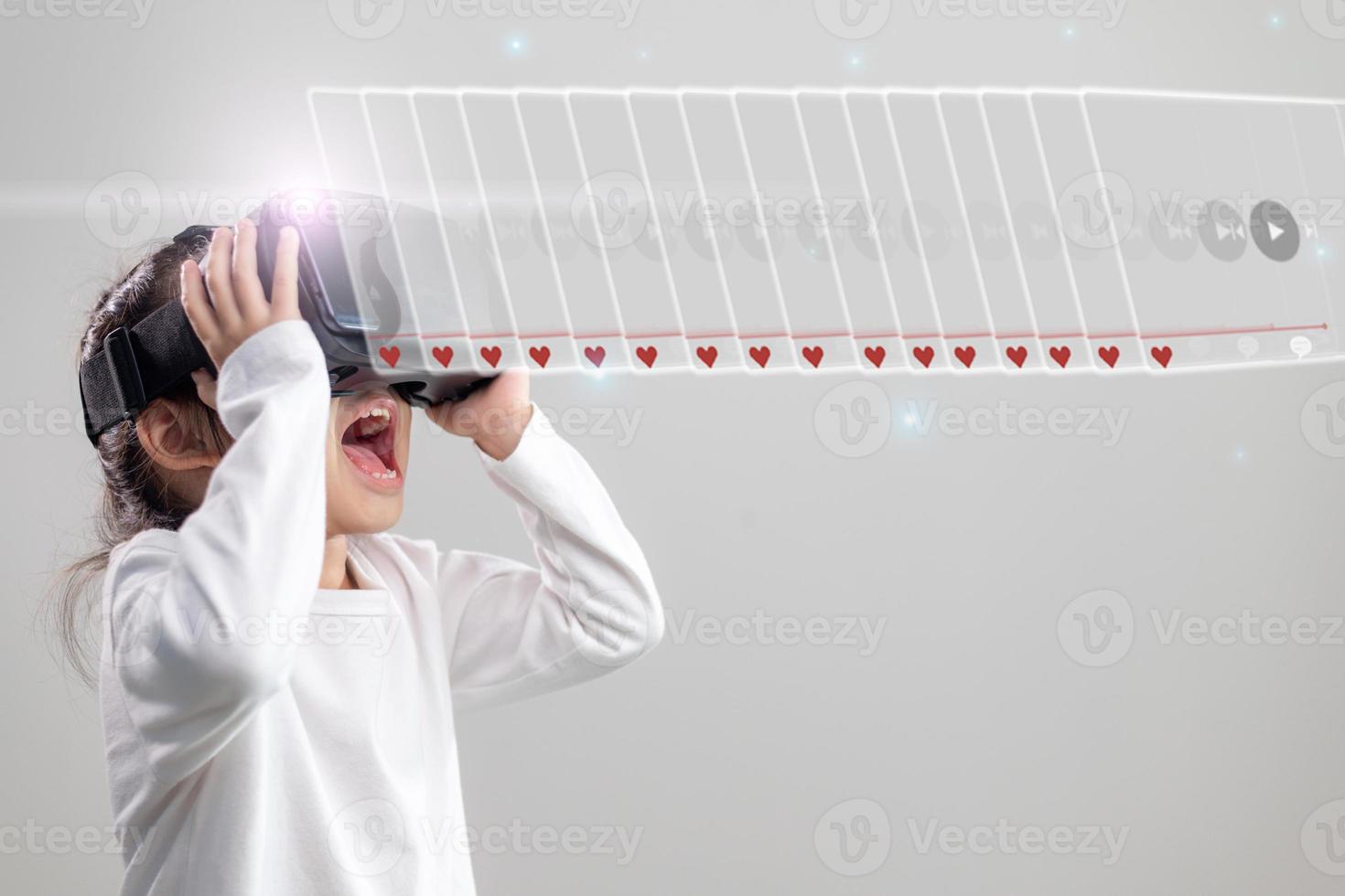 happy girl in glasses of virtual reality. Augmented reality, science, future technology concept. VR. Futuristic 3d glasses with virtual projection. photo